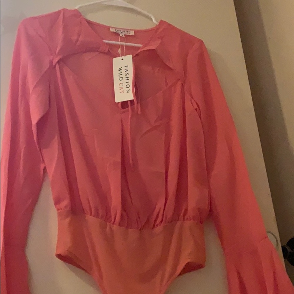 Sheer pink body suit